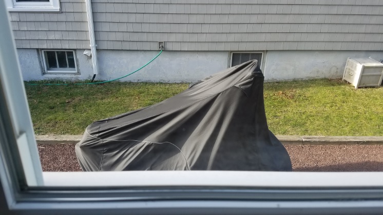 Motorcycle covered in the cold weather